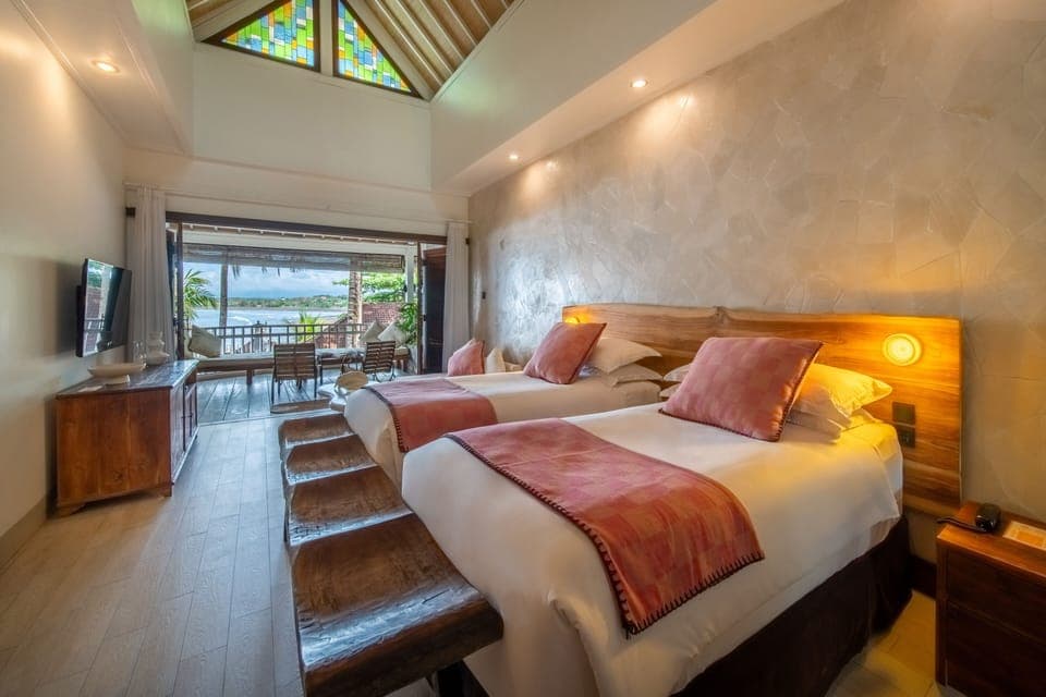 Deluxe Room, Ocean View | Premium bedding, in-room safe, desk, blackout drapes