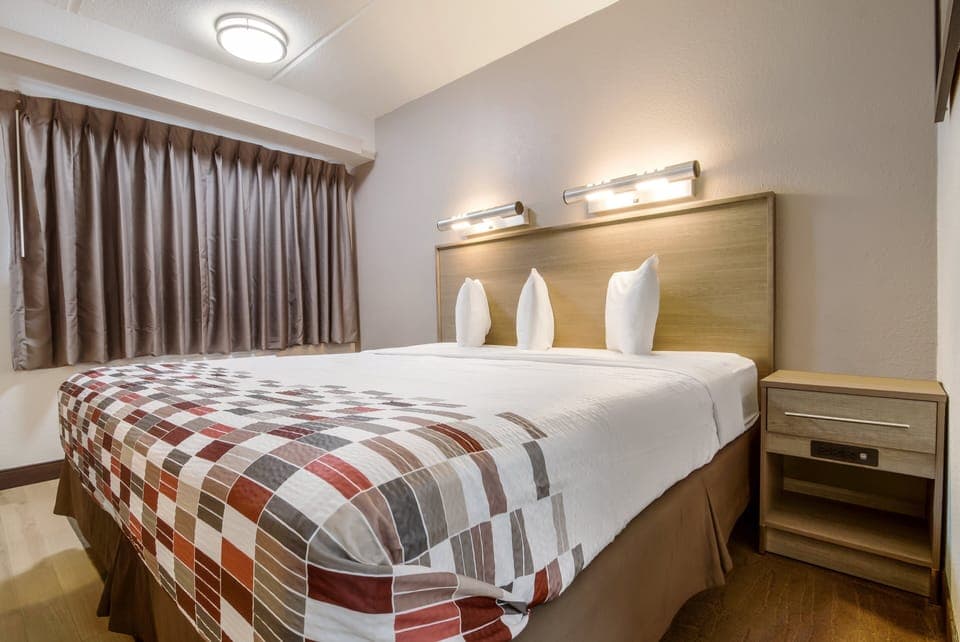 Desk, laptop workspace, blackout drapes, free WiFi