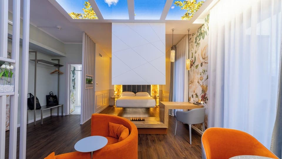 Elite Suite, 1 King Bed, Balcony (Spa Access Included) | 1 bedroom, down comforters, minibar, in-room safe