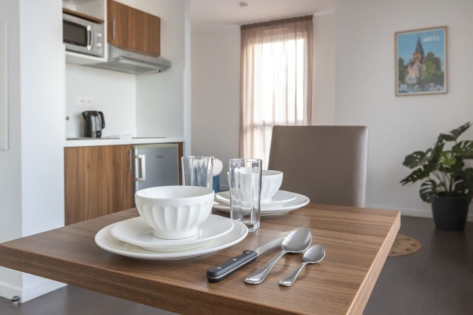 Standard Studio (2 People) | Desk, laptop workspace, soundproofing, free cribs/infant beds