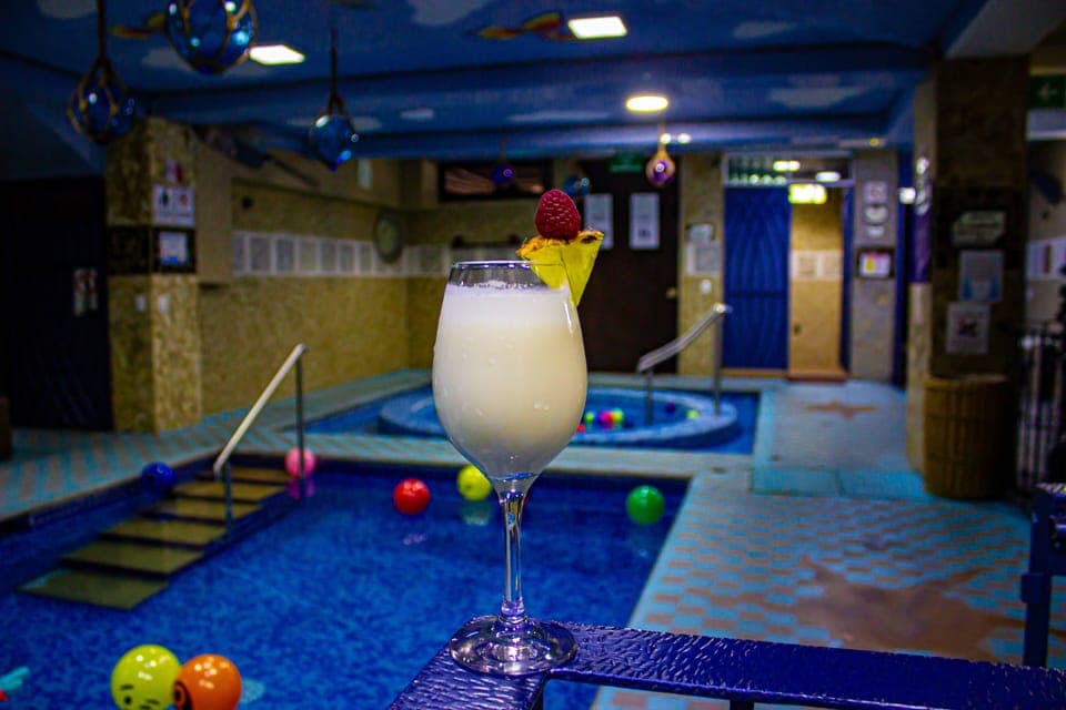 Indoor pool, open 10:00 AM to 10:00 PM, sun loungers