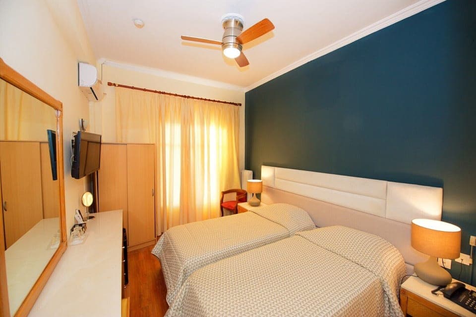 Double or Twin Room | Pillowtop beds, minibar, in-room safe, desk