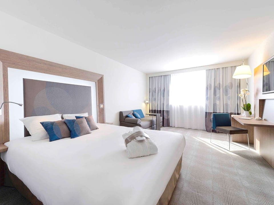 Family Room, Multiple Beds (Family. Shower) | Minibar, in-room safe, desk, blackout drapes