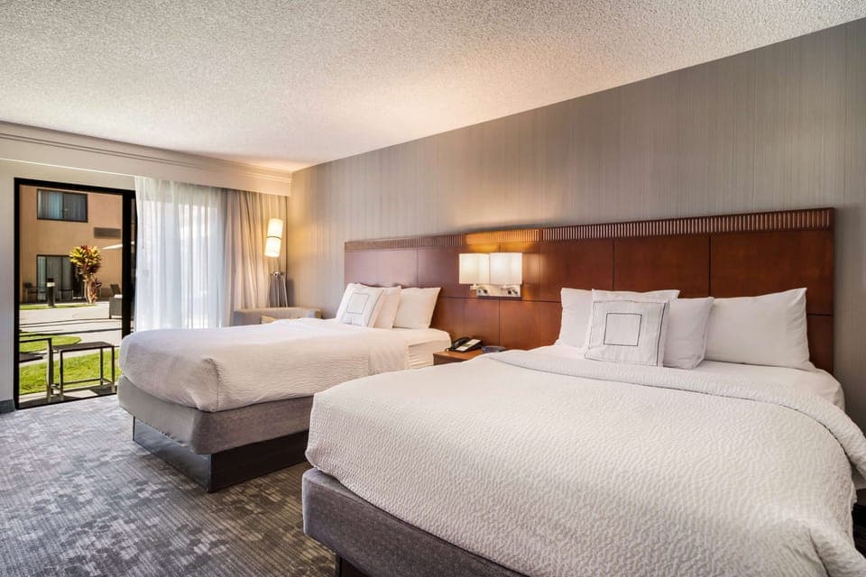 Premium bedding, pillowtop beds, desk, laptop workspace