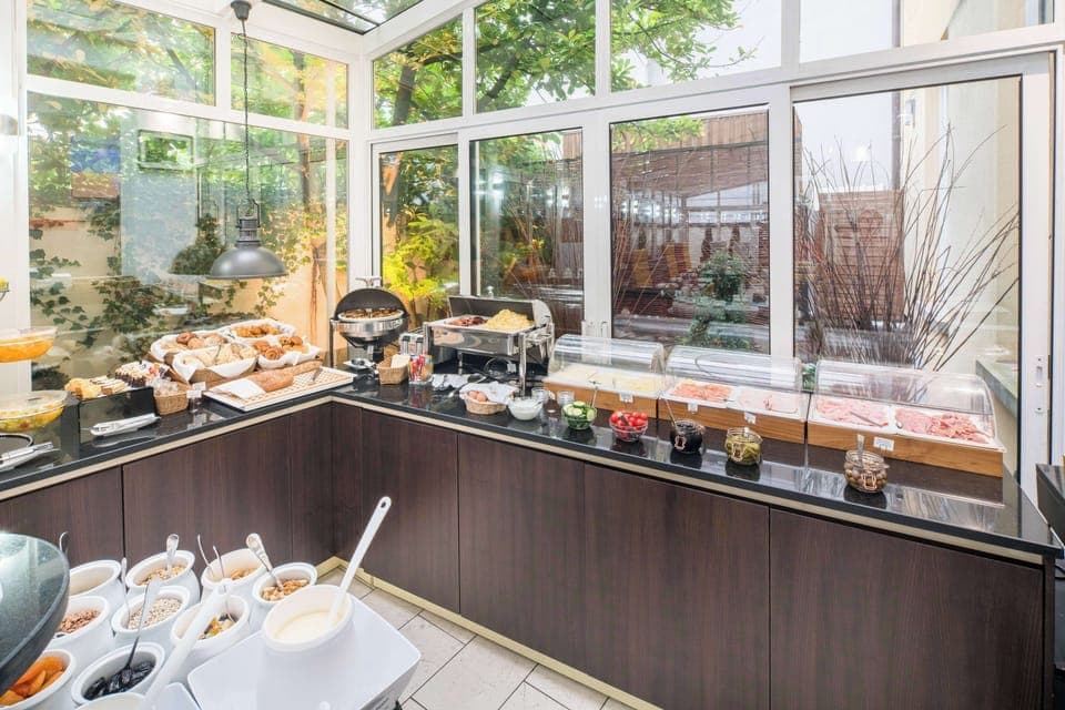 Daily buffet breakfast (EUR 18 per person)