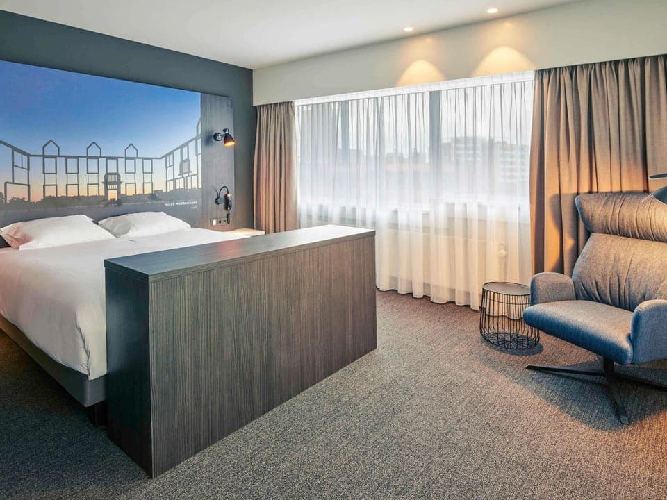 Minibar, desk, blackout drapes, soundproofing