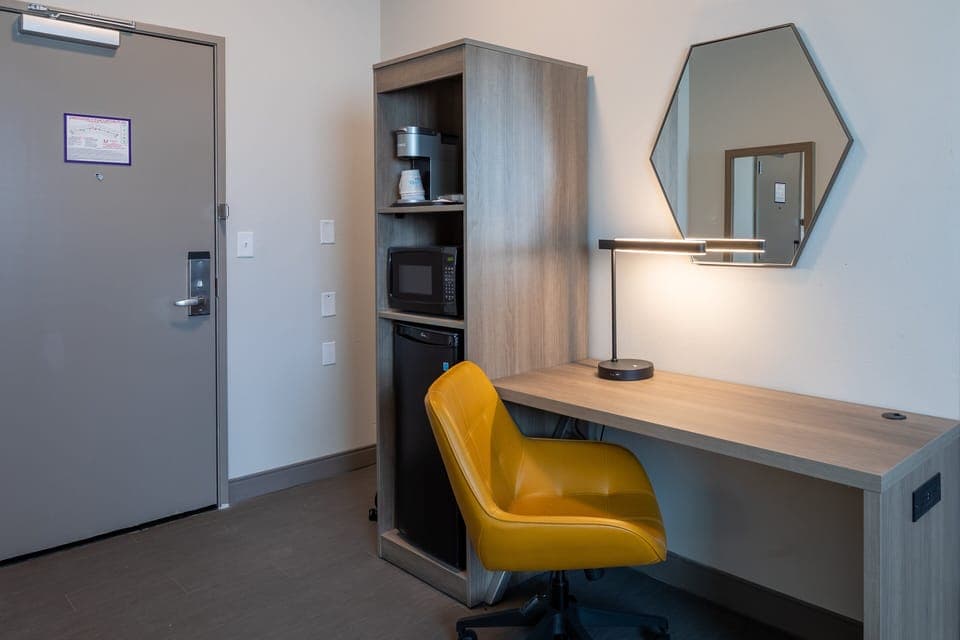 Laptop workspace, blackout drapes, soundproofing, iron/ironing board