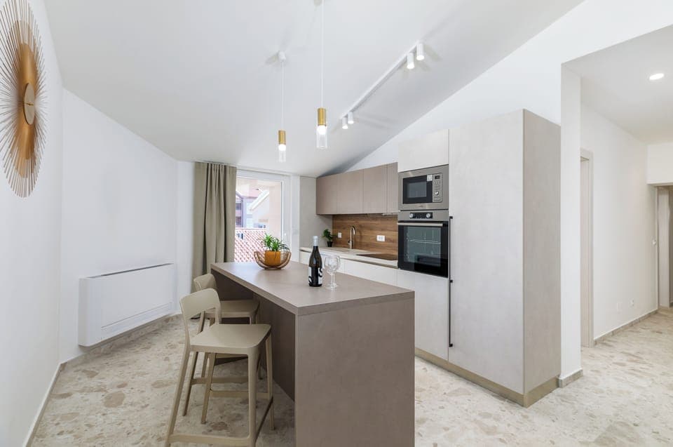 Superior Apartment, 2 Bedrooms, Balcony, Sea View | Private kitchen | Fridge, electric kettle, cleaning supplies