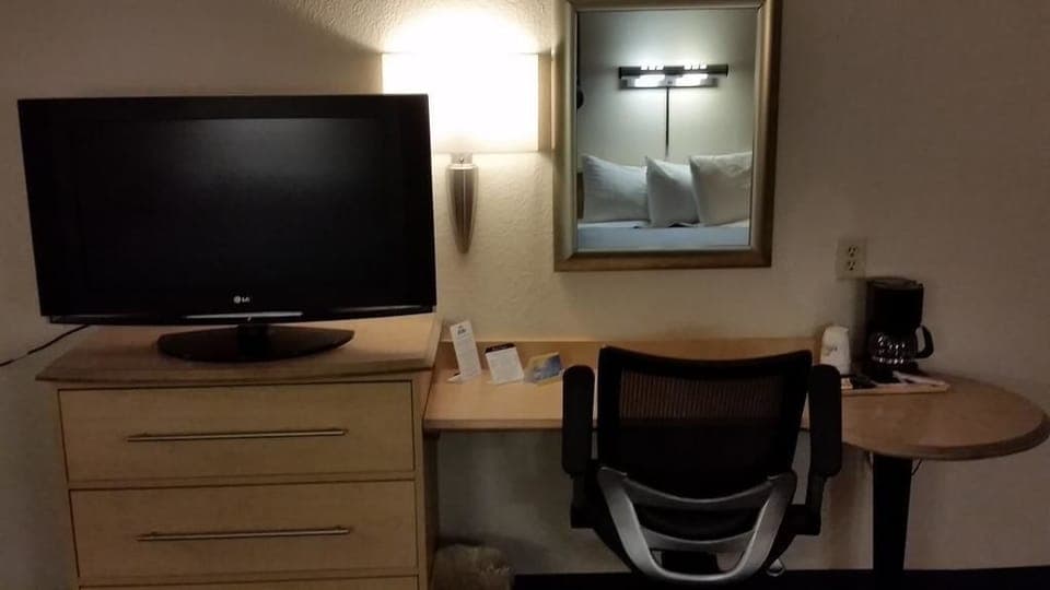 Pillowtop beds, desk, blackout drapes, iron/ironing board