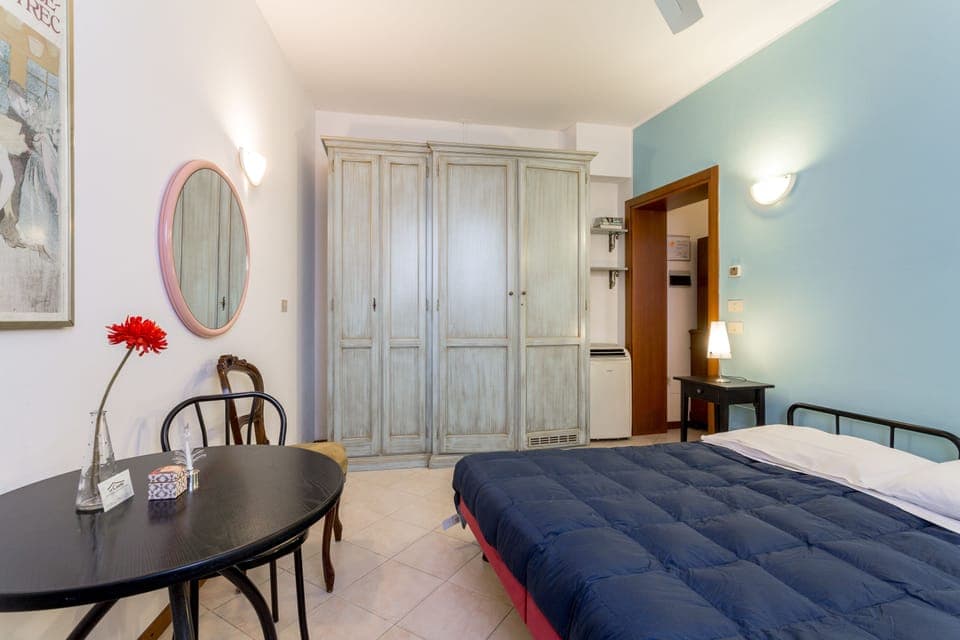 Double or Twin Room | Minibar, iron/ironing board, free WiFi, bed sheets