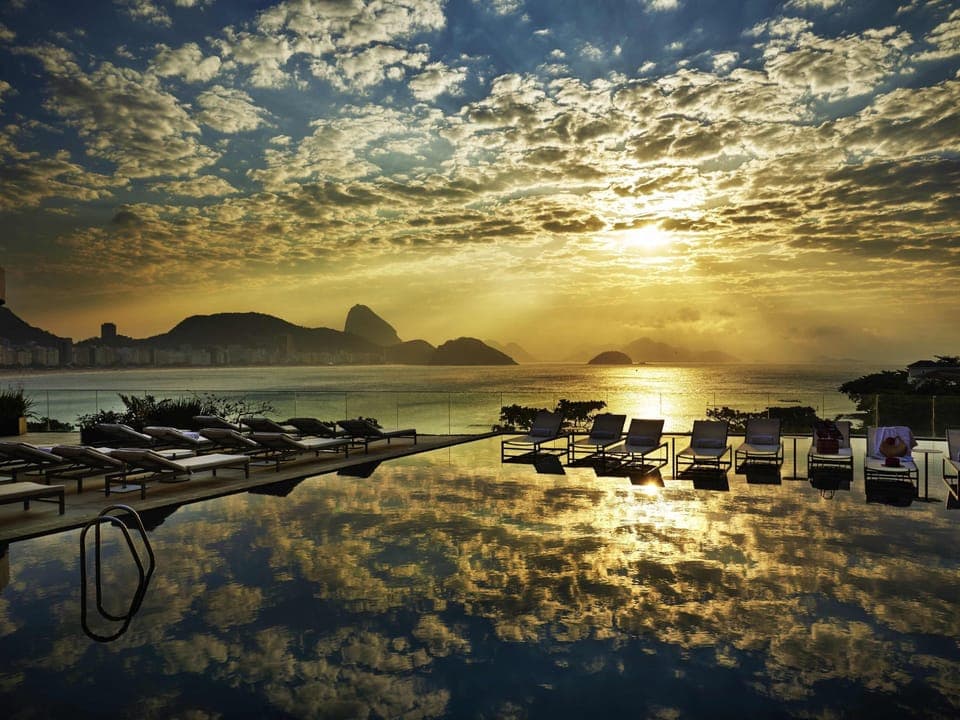 2 outdoor pools, open 7:00 AM to 6:00 PM, pool umbrellas, sun loungers