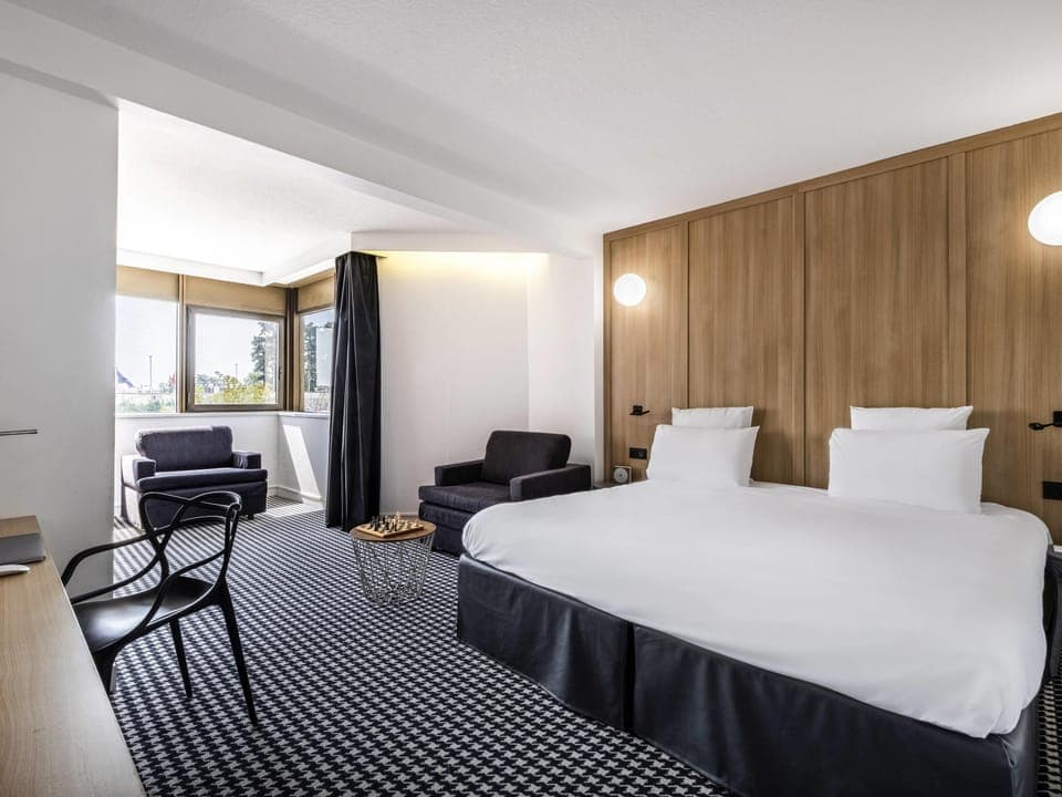 Desk, blackout drapes, soundproofing, iron/ironing board