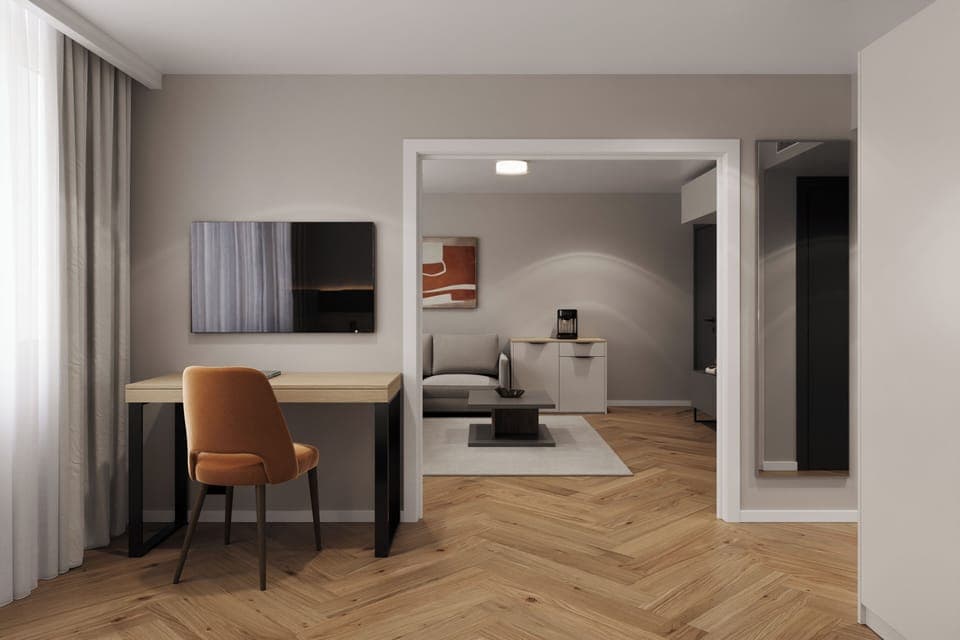 Suite | Living area | 50-inch flat-screen TV with satellite channels