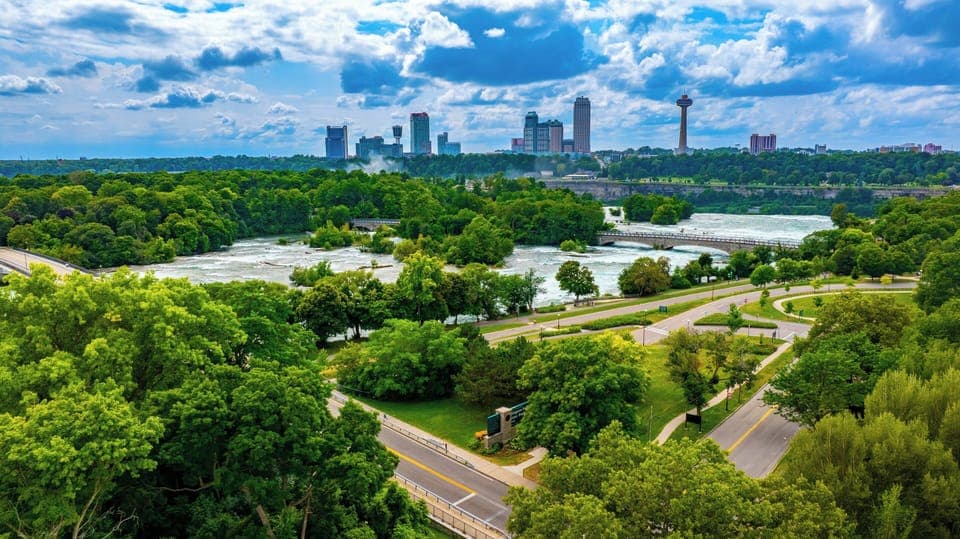 Desk, laptop workspace, blackout drapes, iron/ironing board