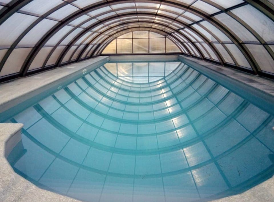 Indoor pool, outdoor pool, pool umbrellas, sun loungers