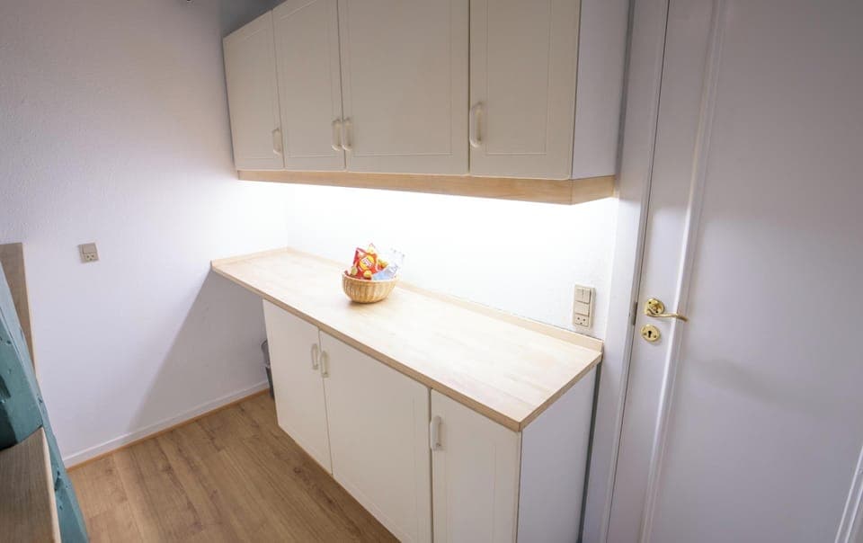 Family Apartment, 3 Bedrooms | Living area | 32-inch flat-screen TV with cable channels, TV