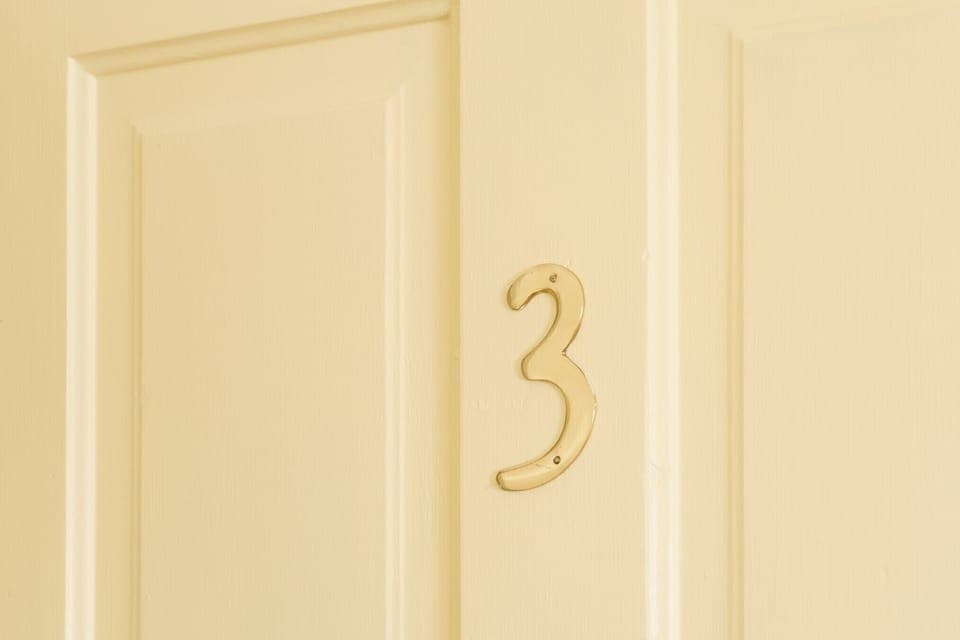 Apartment number 3 at he top of the stairs.