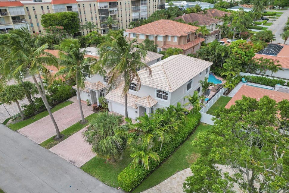 Beautiful Villa Pine is on the right with water fall  pool in the back
