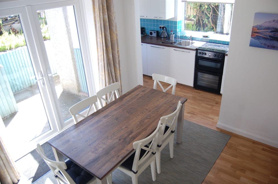 Dining room looking through to the kitchen.