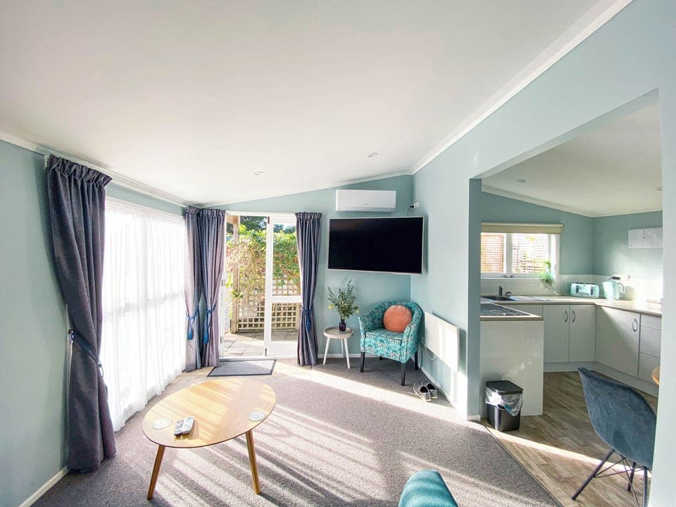 Premium Cottage | Living area | Foosball, table tennis, books