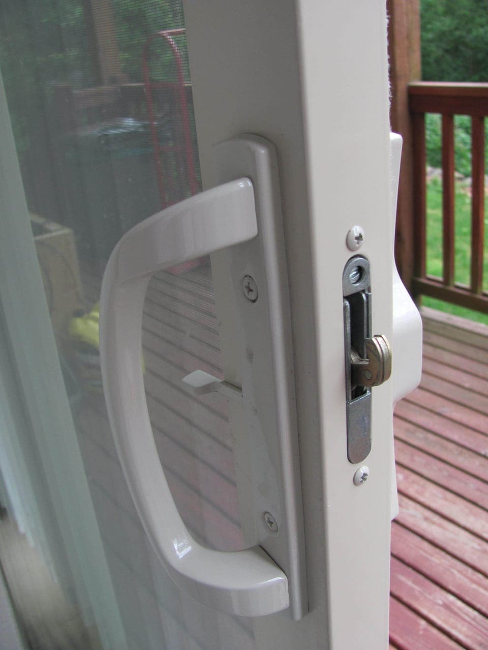 Enter through the sliding door. - key box is next to it