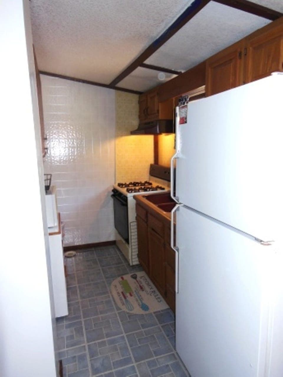 Kitchen has everything you need for daily living, with microwave and coffee pot.