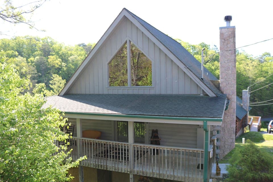 Cabin view from parking spaces, cabin is next to last cabin going down hill