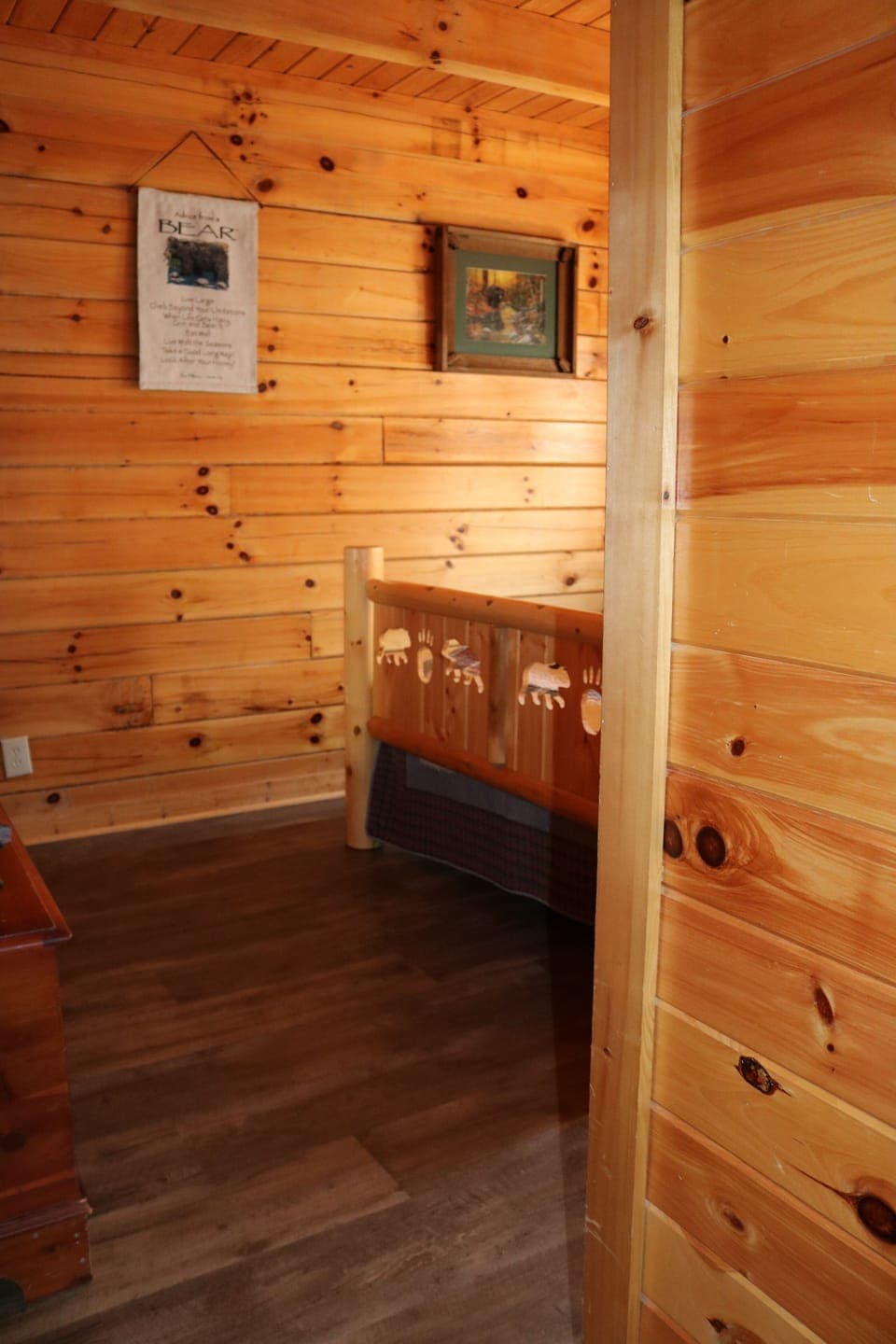 Entrance from hallway to guest bedroom, new hardwood floors