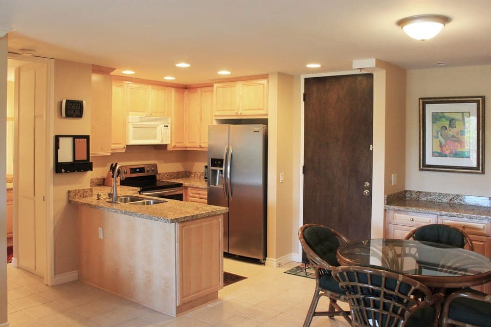 Full kitchen with granite counter tops