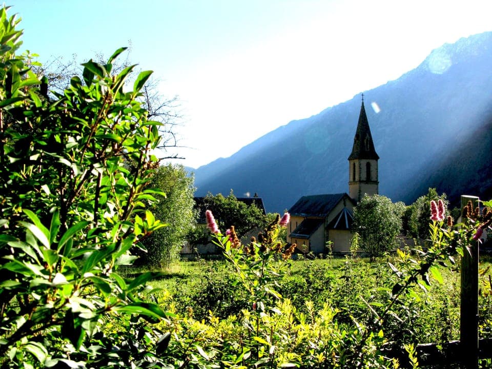 View of Chantelouve church from garden

