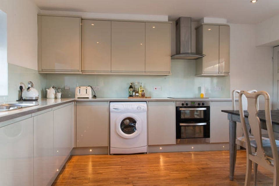 Kitchen with integrated dishwasher.