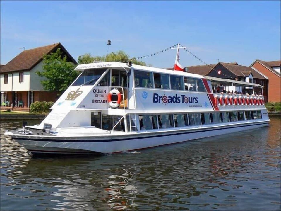 River trip boat passing Star Cottage