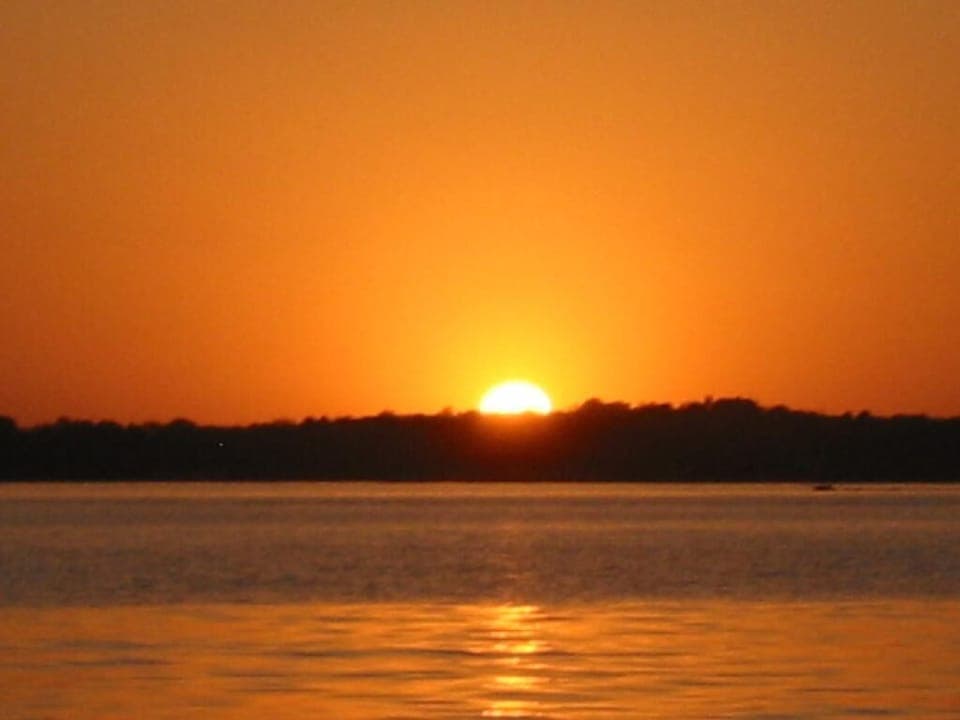 Thanks for looking! Lake LBJ sunset viewed from our boat on open water.