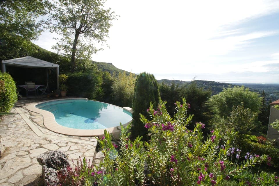 Pool with panoramic views of hills and sea