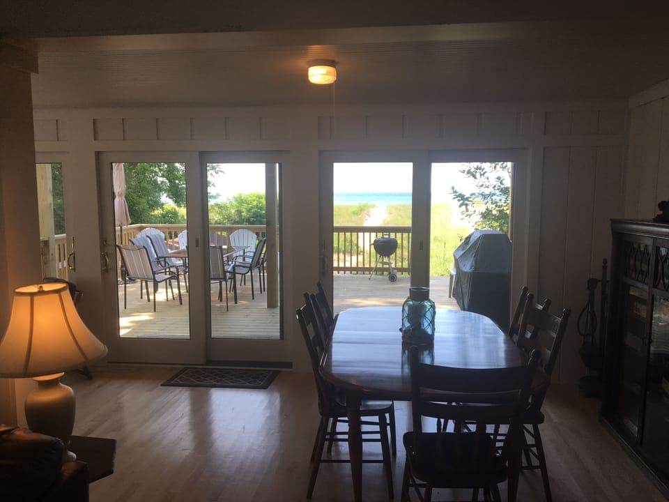 A second seating area on first floor. Porch in background