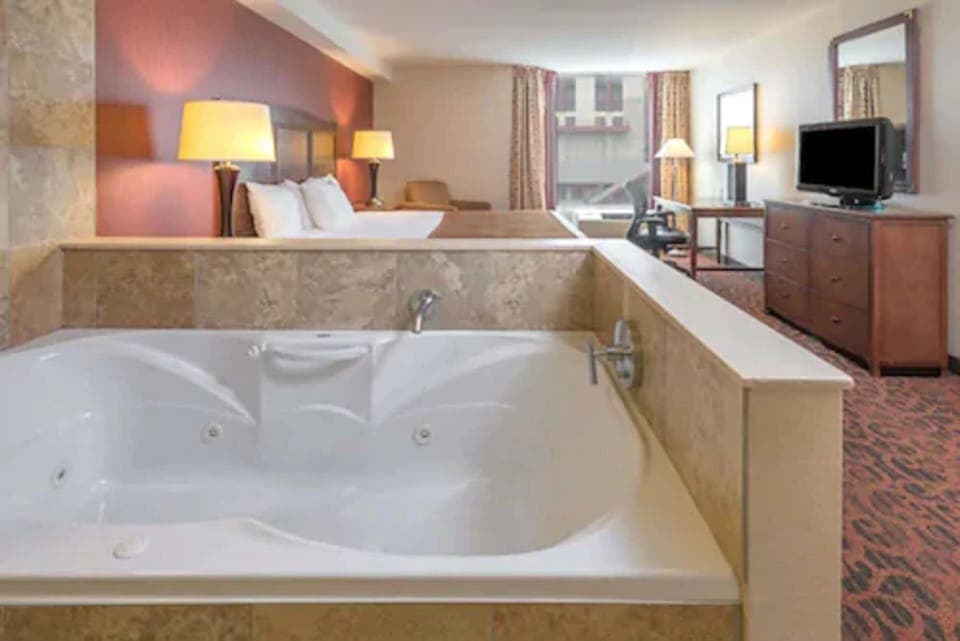 Desk, blackout drapes, soundproofing, iron/ironing board