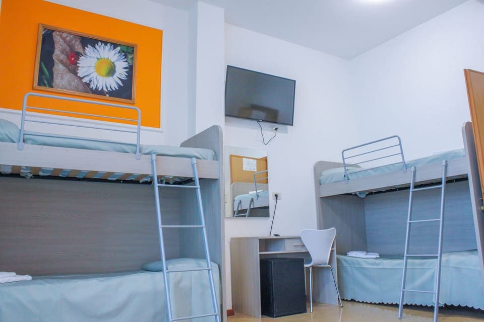 Quadruple Room (Beach access included) | Desk, free cribs/infant beds, bed sheets
