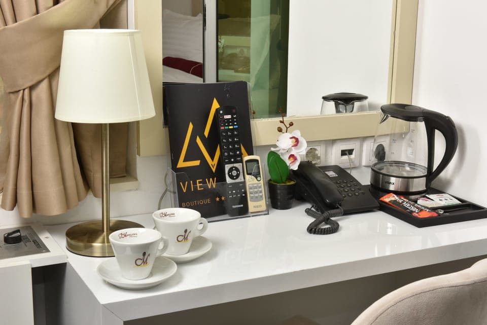 Economy Double Room, 1 Queen Bed, Balcony, City View | Room amenity