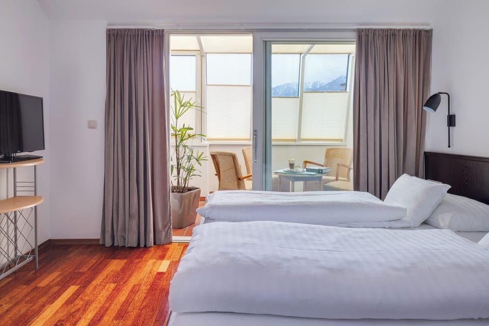 Standard Triple Room | Premium bedding, minibar, in-room safe, iron/ironing board