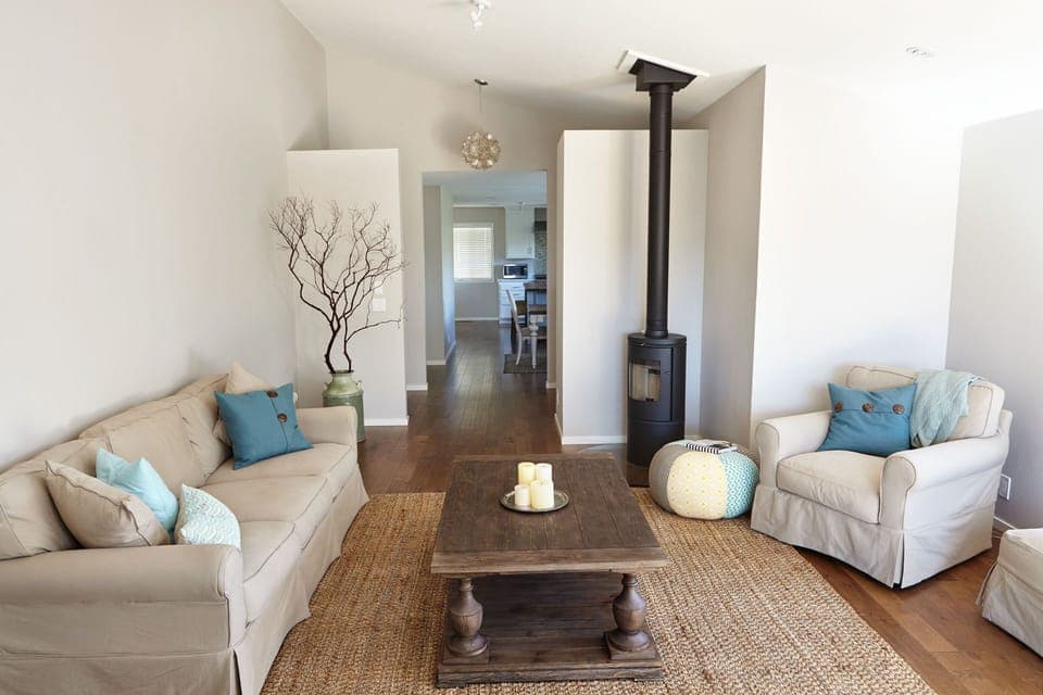 View of living room and wood burning stove, ideal for cool winter evenings
