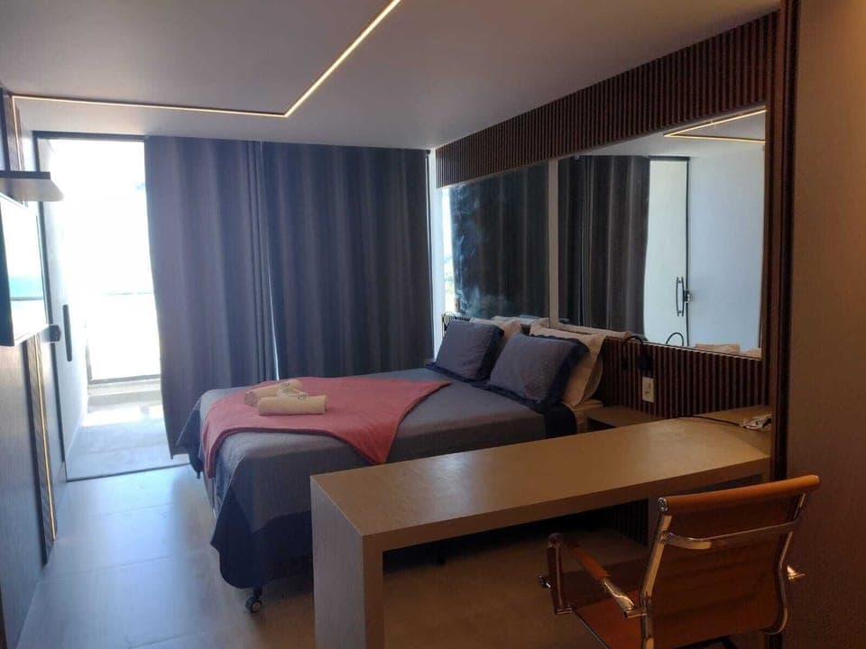 Deluxe Room | Desk, laptop workspace, blackout drapes