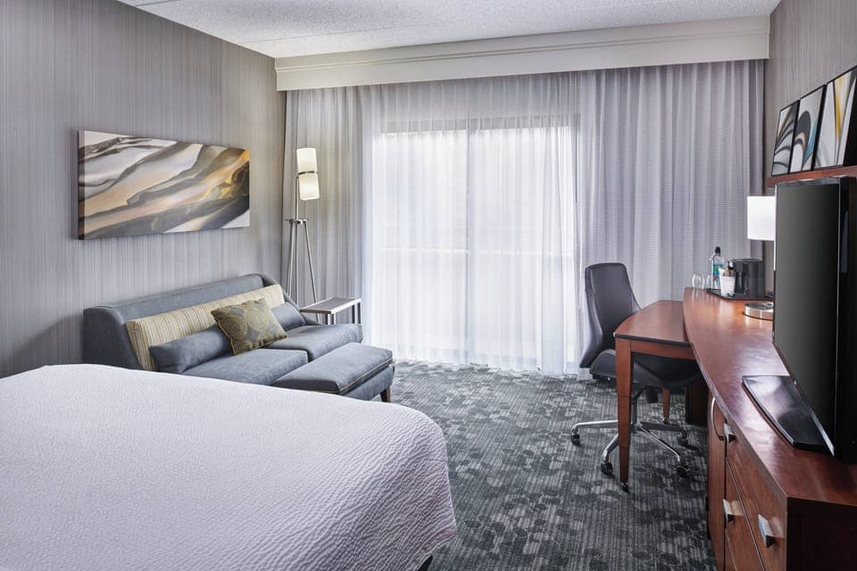 Hypo-allergenic bedding, pillowtop beds, desk, laptop workspace