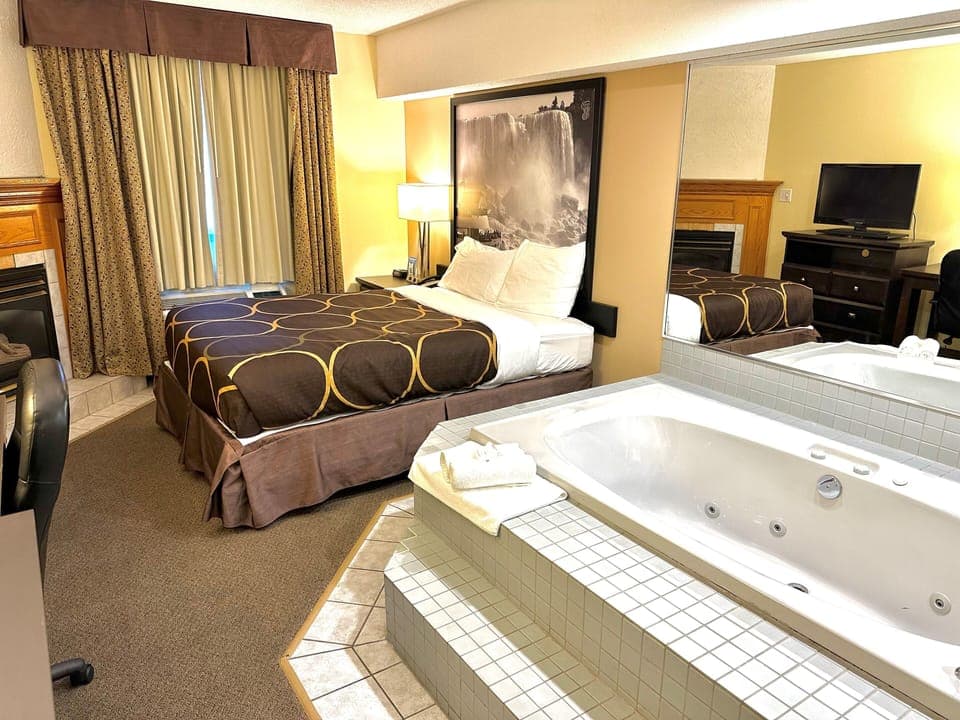 Deluxe Room, 1 Queen Bed, Non Smoking | Desk, iron/ironing board, free WiFi, bed sheets