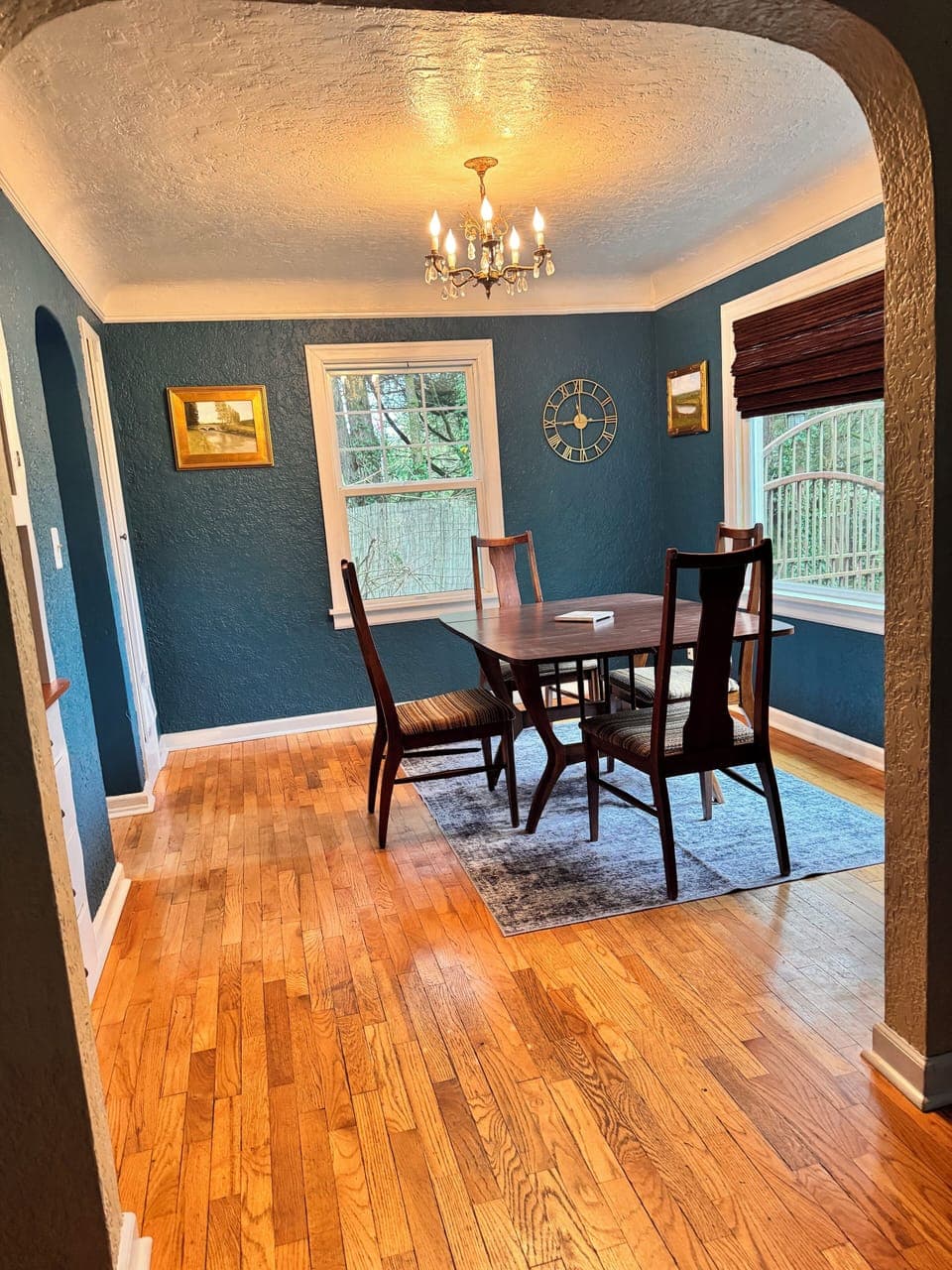 Dining room- 
cabinet with iron, table/extens. in kitchen cabinet- L of fridge