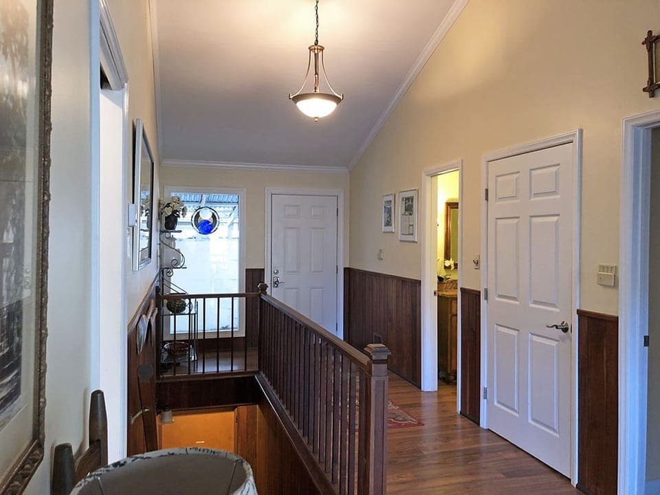 Entry Foyer and Stairs down to Lower Level - looking from Dining and Family Room.