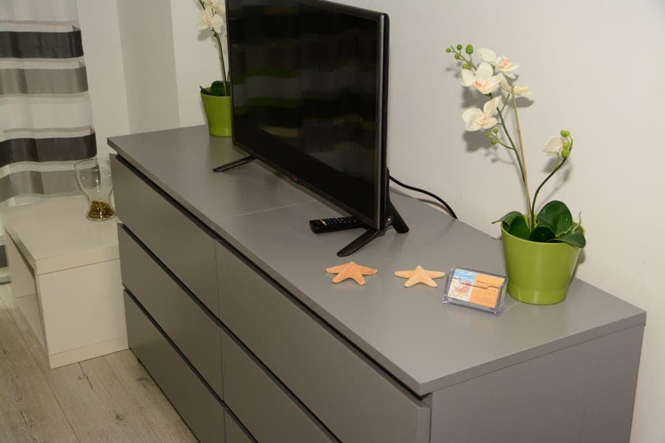 Apartment (Bursztynowy) | Living area | Flat-screen TV