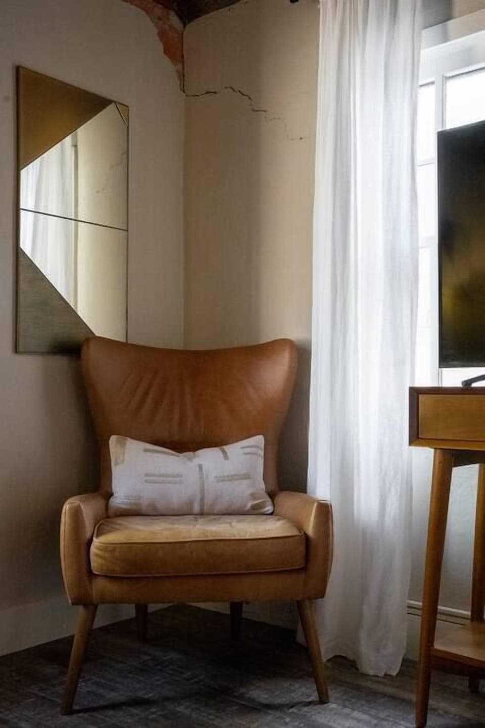 Reading Nook – Cozy chair for quiet moments.