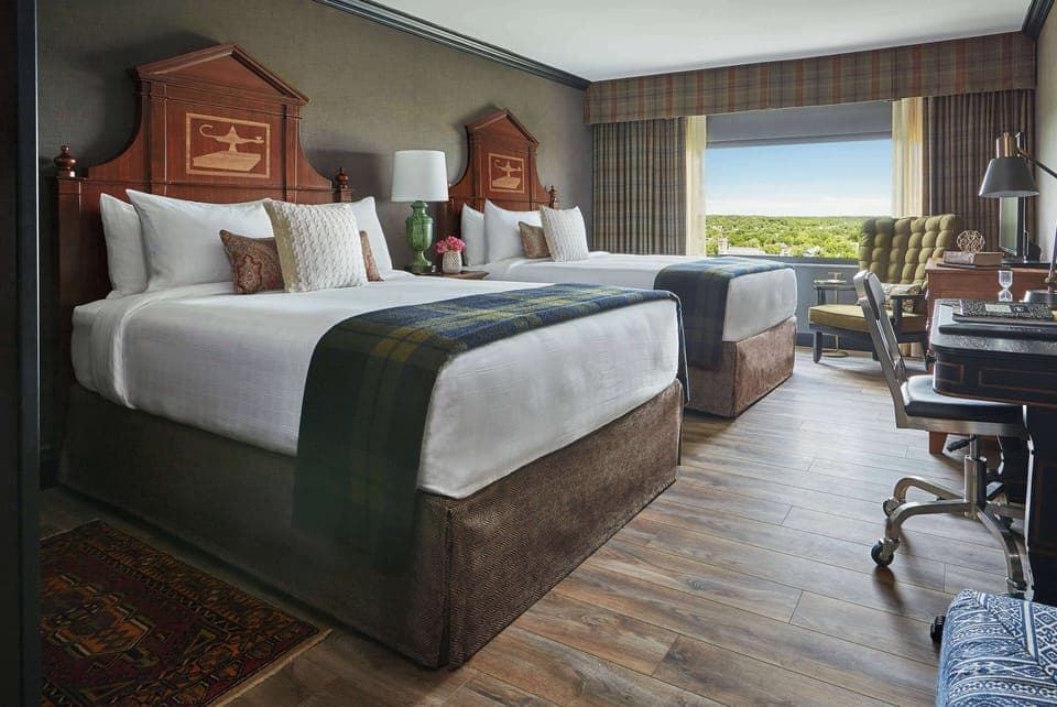 Premium bedding, down comforters, in-room safe, desk