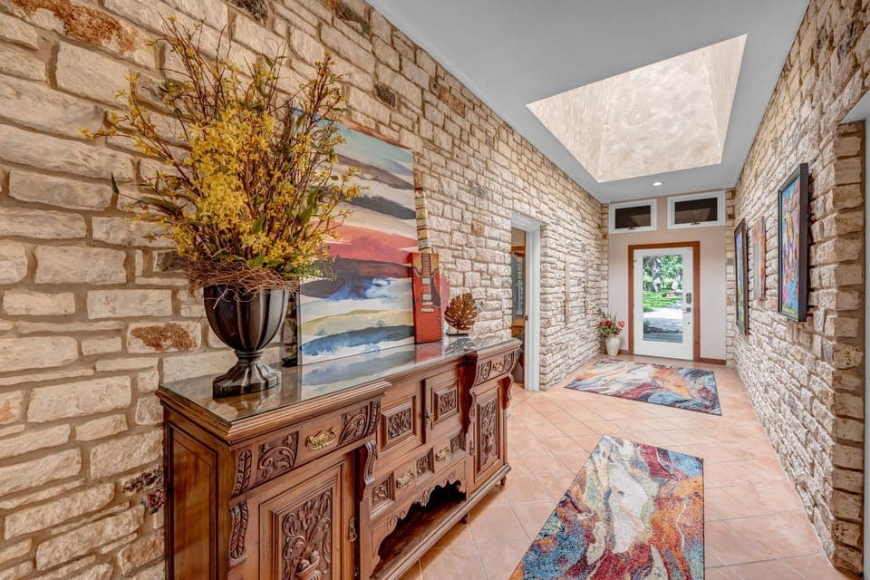 Stone entry way - splits the house into 2 sides