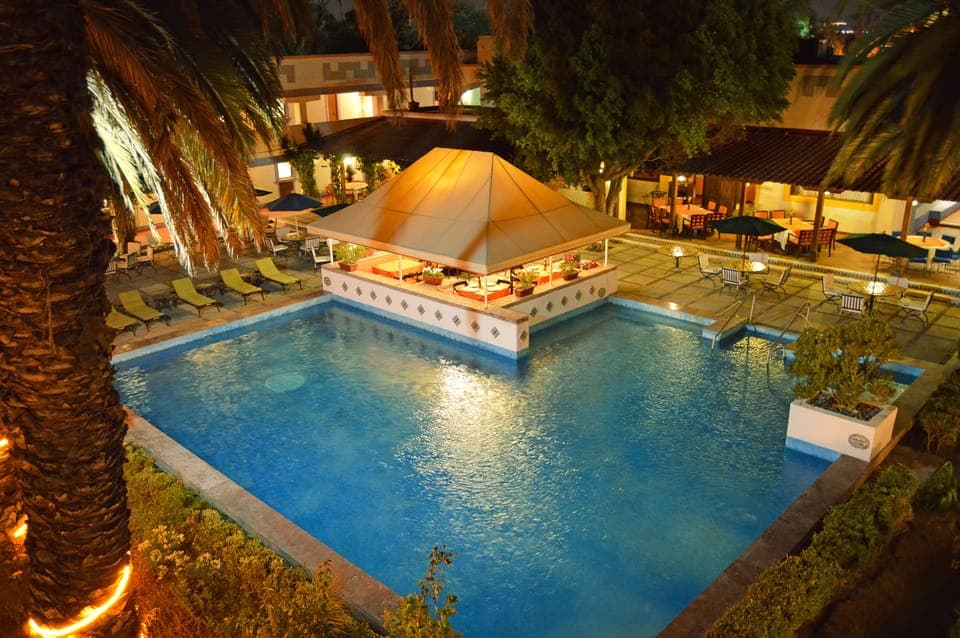 Outdoor pool, pool umbrellas, sun loungers